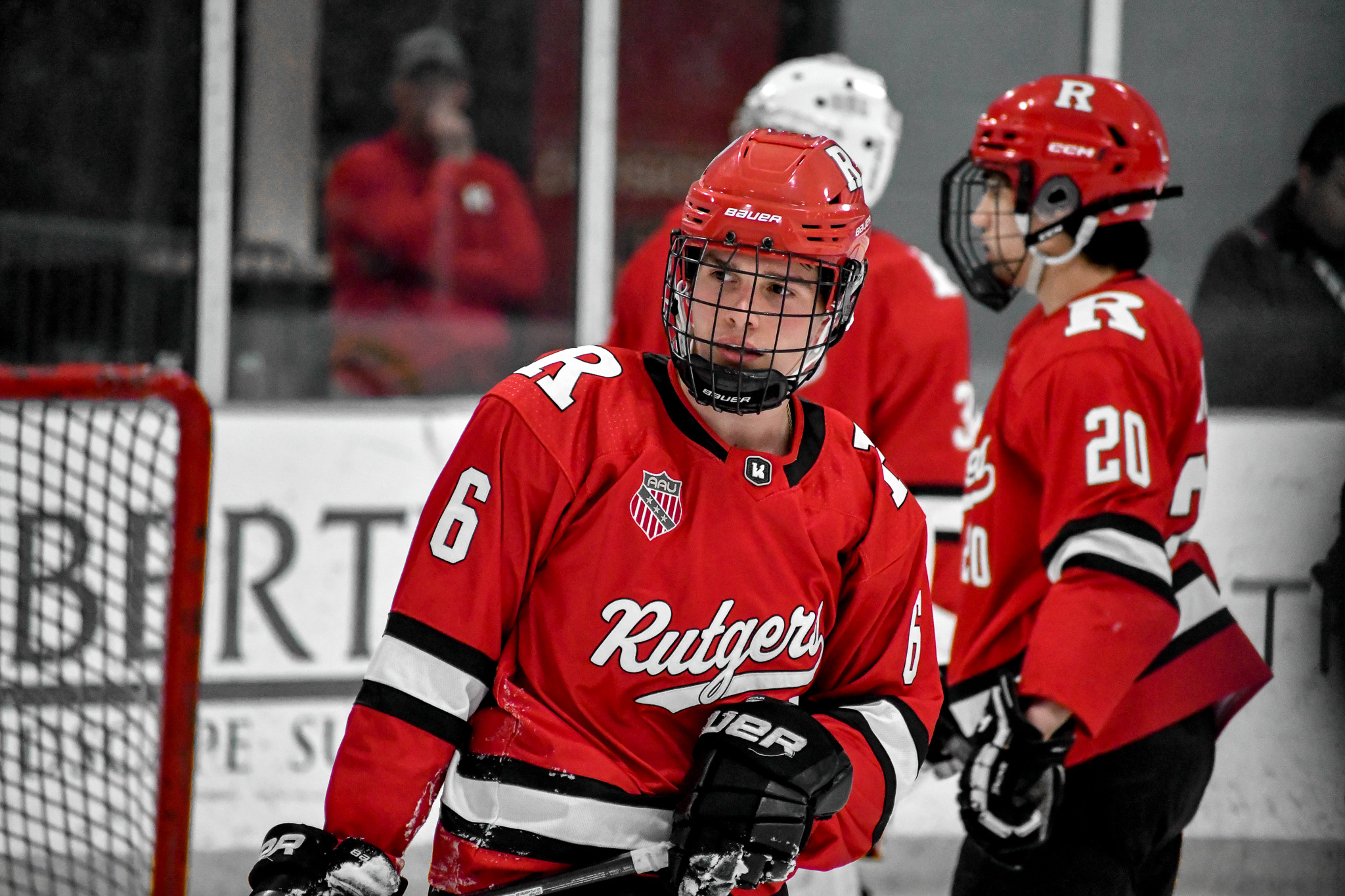 Rutgers player looking on from the ice